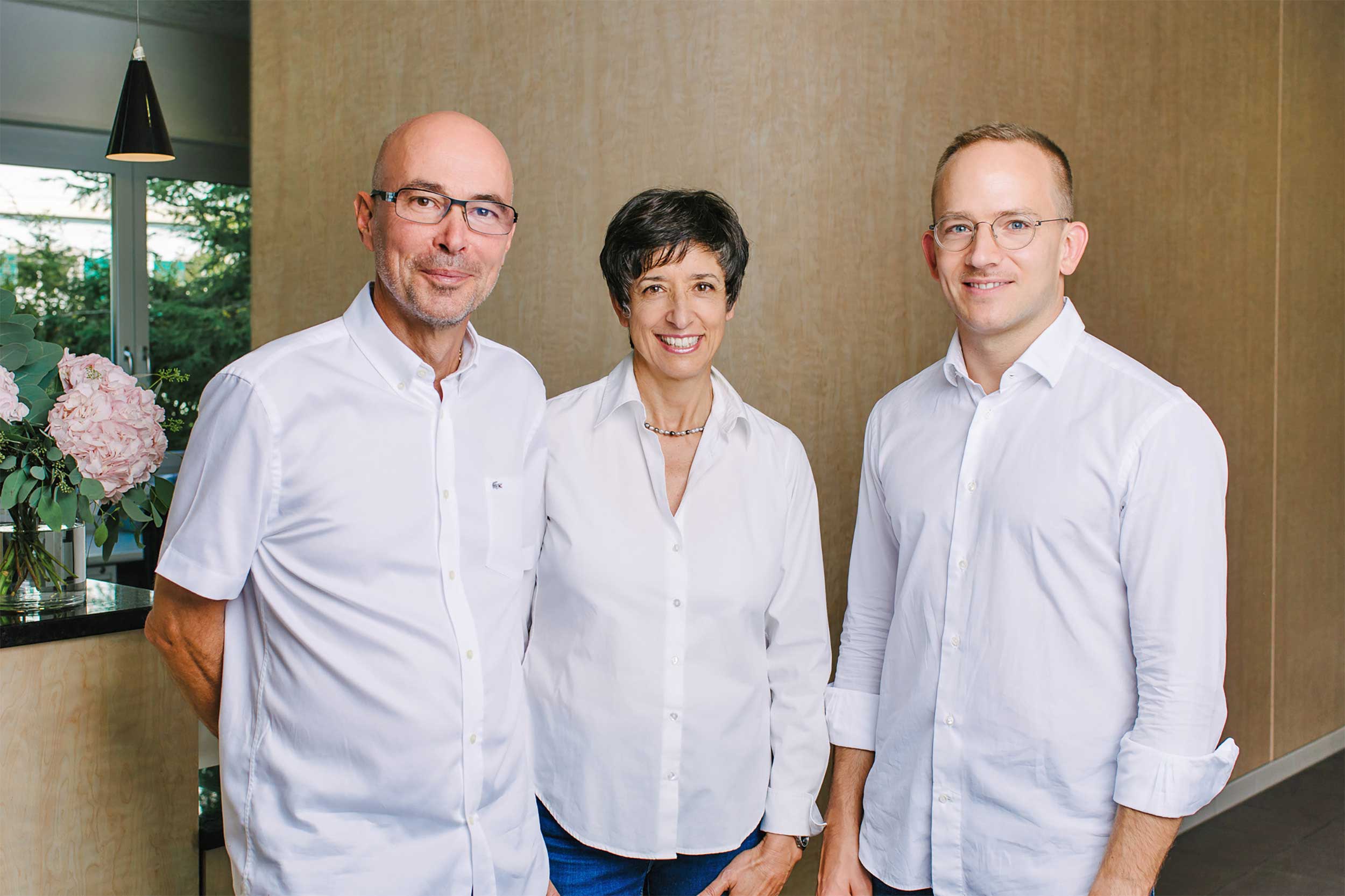 Portrait von Dr. Tobiaas Waller, Dr. Elisa Zehnder und Dr. Hubert Zehnder